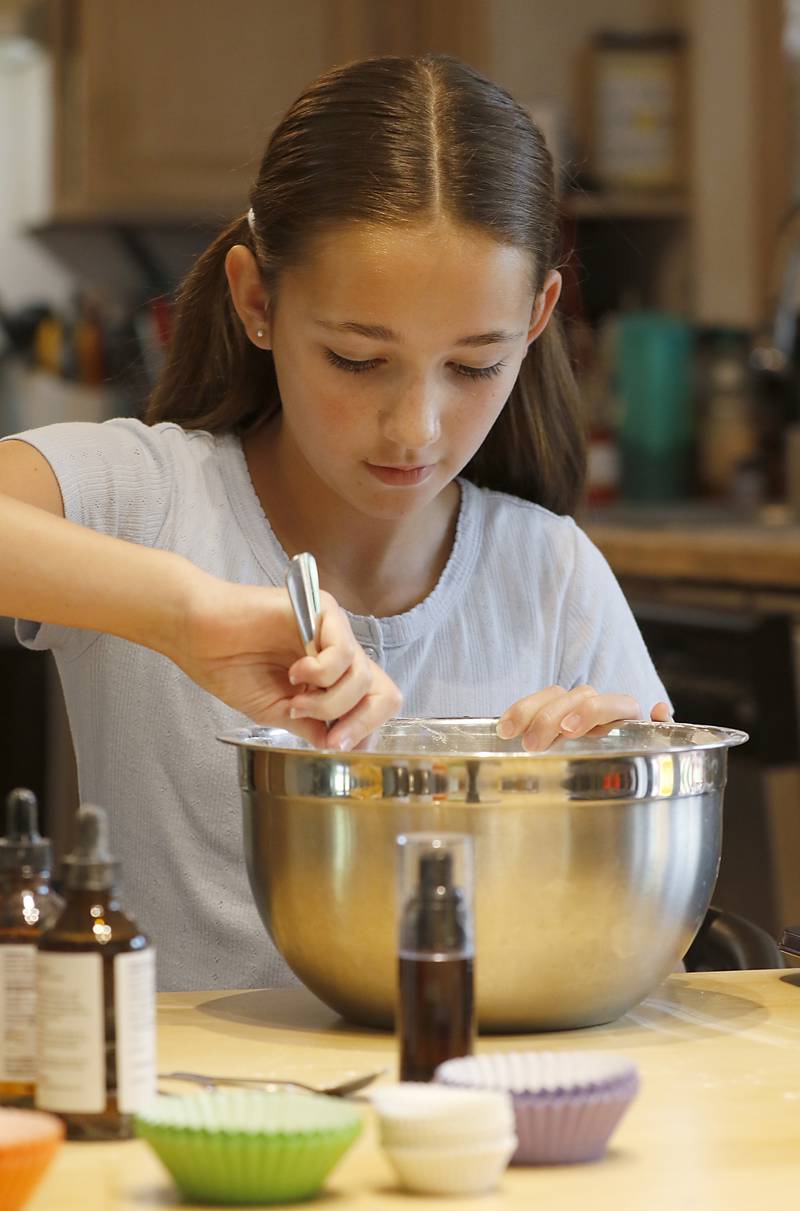 Tenlee Pedersen with some of the bath bombs she makes to sell on Thursday, July 31, 205, and her home near Union. She is one of several young entrepreneurs who will be taking part in a junior market will launch for the first time at the Huntley Farmers Market.