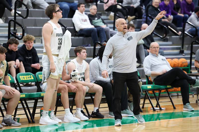 Bishop McNamara head coach Adrian Provost calls out a play during the Fightin' Irish's 61-24 victory over Wilmington in the IHSA Class 2A Seneca Sectional semifinal on Tuesday, March 3, 2026.
