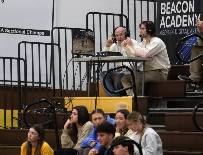 Jim Hinkle calls game action from the Beacon Academy booth as Jacobs plays Barrington during Hinkle Holiday Classic varsity boys basketball tournament action on Monday, Dec. 23, 2024 at Jacobs High School in Algonquin.