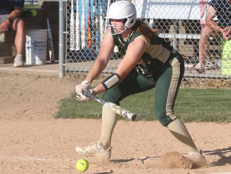 St. Bede's Reagan Stoudt lays down a bunt in the Class 3A Sectional championship game on Friday, May 26, 2023 at St. Bede Academy.