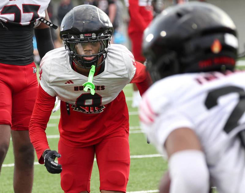 Northern Illinois University cornerback Dev'ion Reynolds looks to make a tackle Tuesday, April 14, 2026, during a drill at spring practice in Huskie Stadium at NIU in DeKalb.