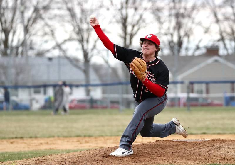 Hall junior Pat Dye delivers a pitch Monday at Princeton.