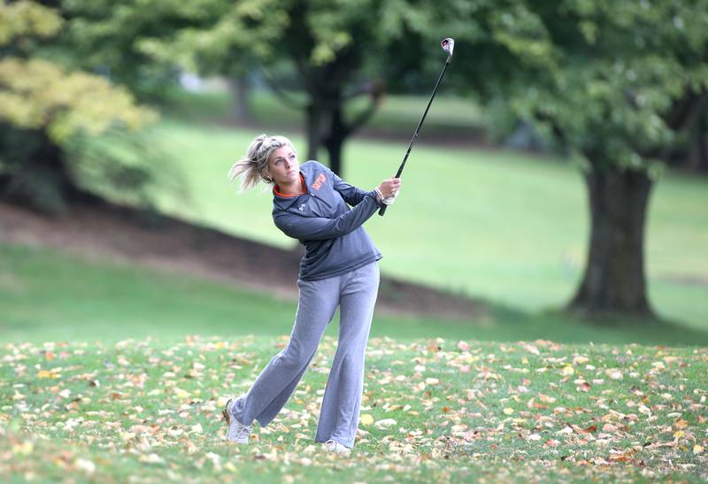 Wheaton Warrenville South’s Grace Cavin hits from the fairway during the Class 2A Glenbard North Regional girls golf meet at Bloomingdale Golf Club on Thursday, Sept. 28, 2023.