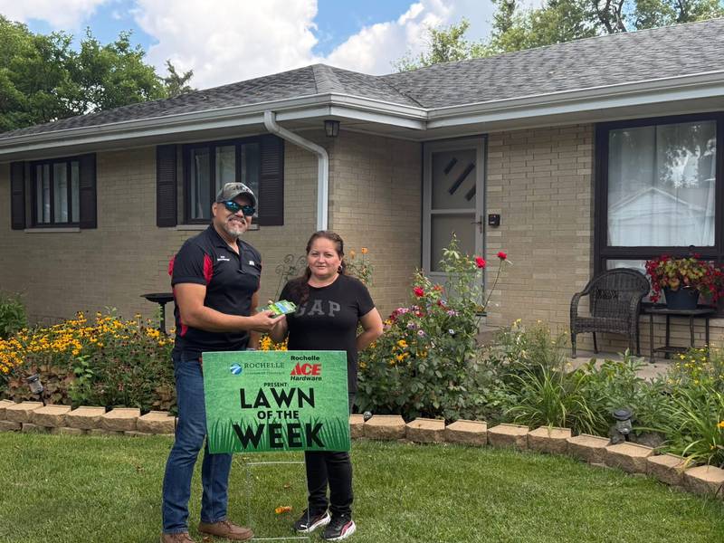 The Rochelle Chamber of Commerce recently presented its Lawn of the Week award for the week of Aug. 22 to Jose and Lourdes Arroyo. They received a sign and a $25 Rochelle ACE Hardware gift card, presented by Rochelle Ace Hardware Manager Jesse Lopez.