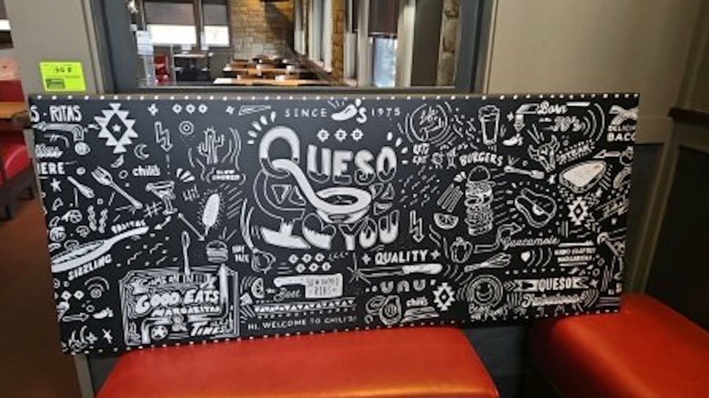 The online auction will take place on Jan. 14. Fans of Chili’s restaurants might be interested that among the items for sale in the auction is a Chili’s branded decorative wall art panel featuring white chalkboard-style illustrations and text including “Queso I Love You,” “Good Eats” and “Welcome to Chili’s.”