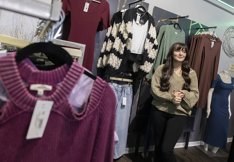 Kelly McKeown, an employee at Refined Boutique in downtown Dixon, talks about the business Tuesday, Dec. 3, 2024.