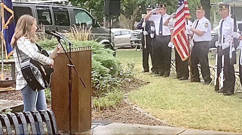 Lilly Mabry of Princeton sings the National Anthem during Monday's 9-11 Remembrance at Soldiers and Sailors Park in Princeton.