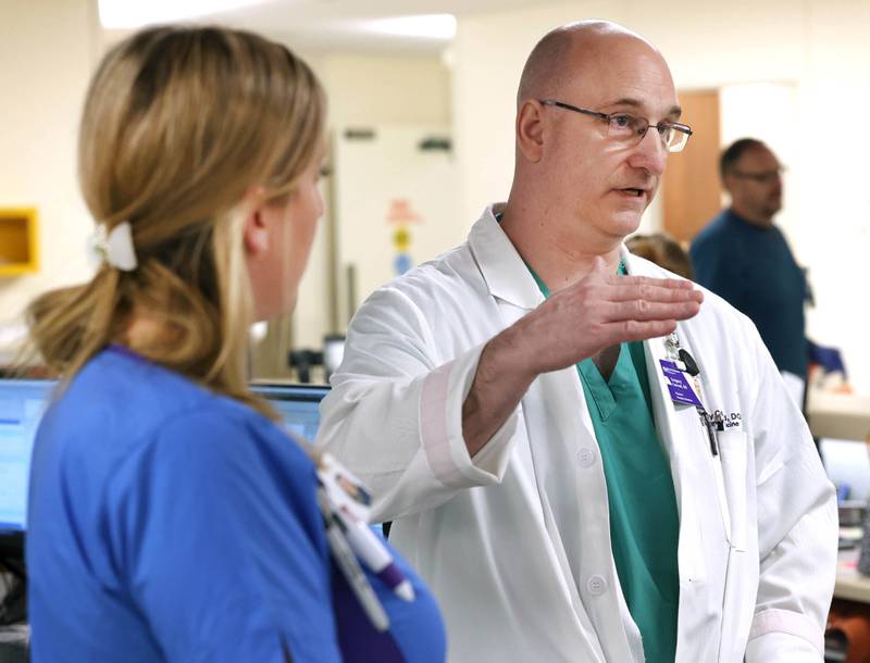 Dr. Gregory Conrad along with nurse Randa Melms talk in the emergency room Thursday, April, 18, 2024, at Northwestern Medicine Kishwaukee Hospital in DeKalb.