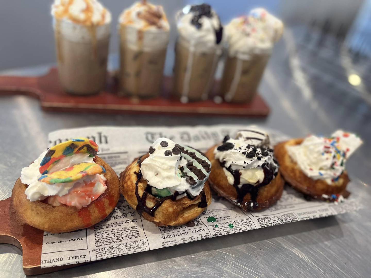 The cafe plans to remember its roots by carrying customer favorites, such as the coffee and waffle flights. Customers pick four types of waffles or coffee from an extensive list of seasonal and unique flavors.