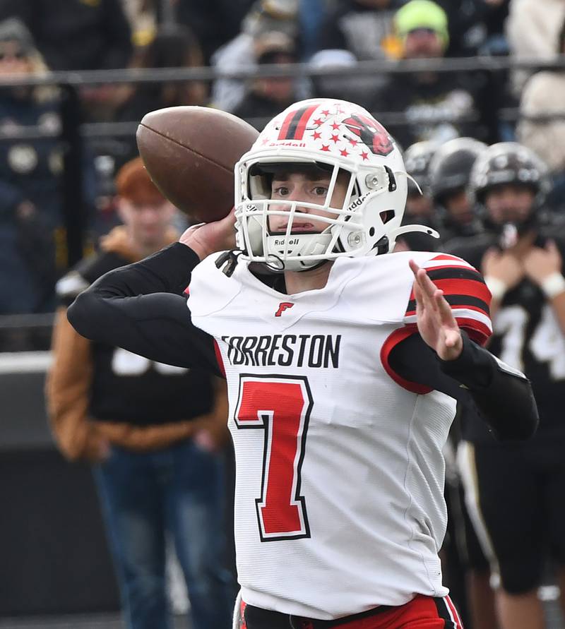 Forreston's Brady Gill gets ready to pass to Connor Politsch for a two-point conversion against Lena-Winslow in 1A playoff action in Lena on Saturday, Nov. 1, 2025.