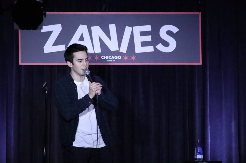 Comedian Des Mulrooney performs at a past show.