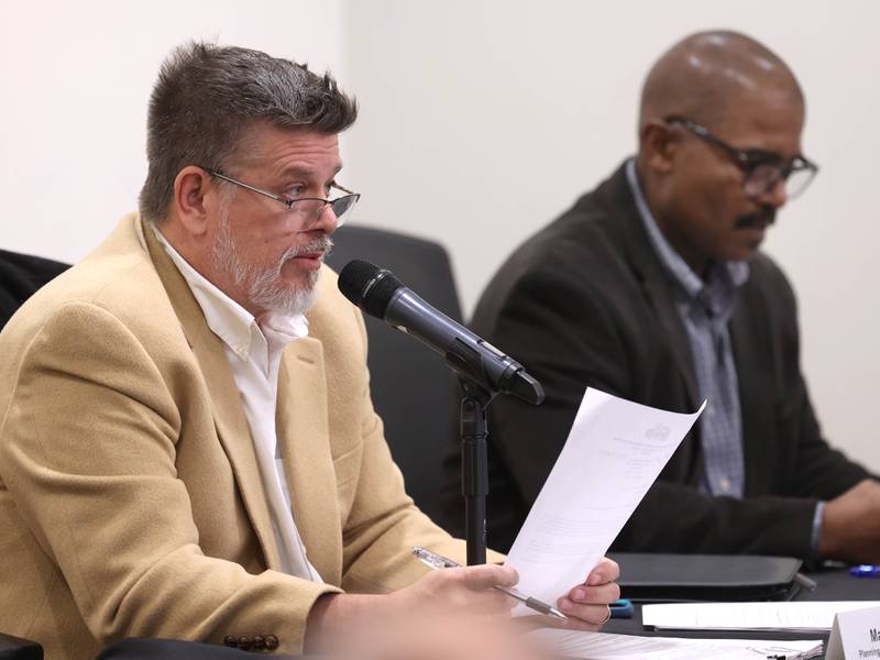 DeKalb Planning and Zoning Chairman Max Maxwell speaks Monday, Dec. 1, 2025, about the proposed 560-acre Endeavour Energy data center during the Planning and Zoning Commission hearing at the DeKalb Public Library.