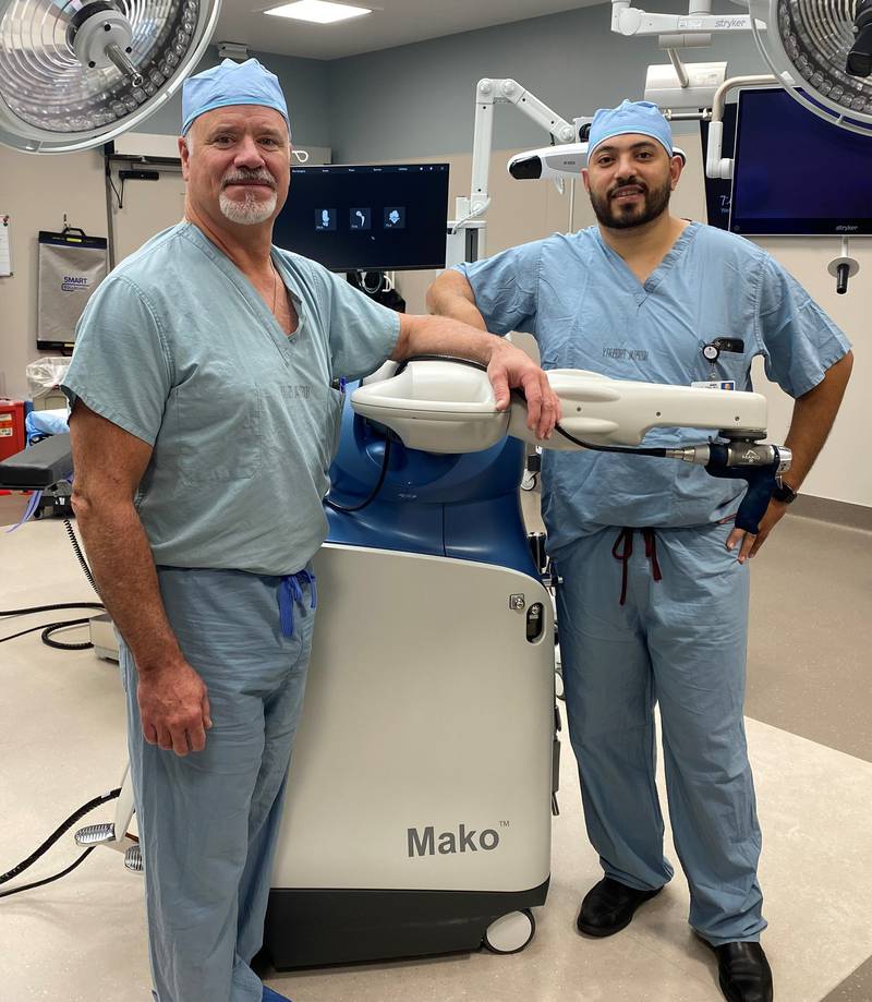 Orthopedic Surgeons Paul Perona, M.D. (from left), and Ahmed Eldib, M.D., are using Mako Robotic-Arm Assisted Surgery at Morris Hospital for total hip, total knee, and partial knee replacement surgeries. The addition of the new technology follows recent renovations to Morris Hospital’s surgical suite.