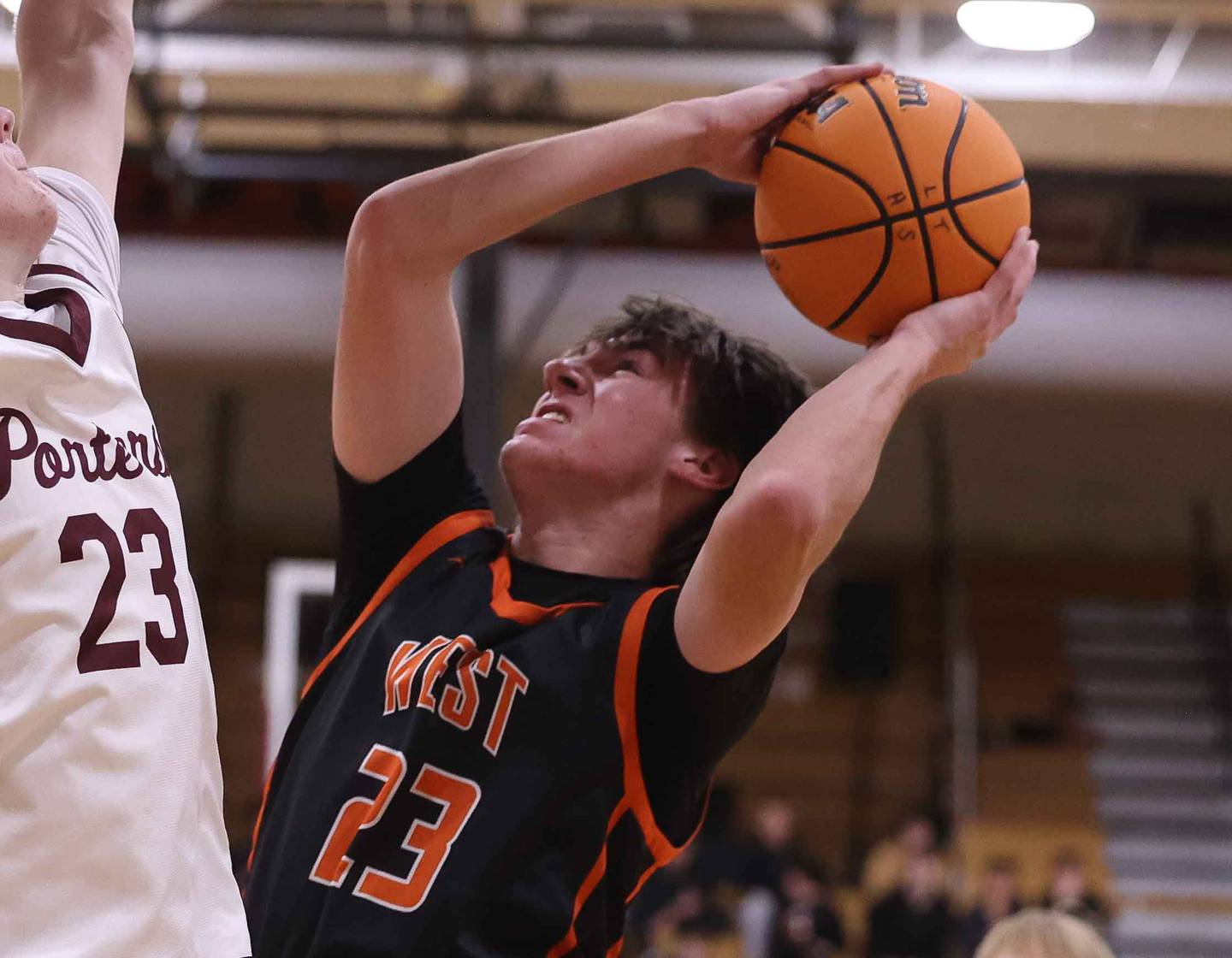 Lincoln-Way West’s Wyatt Carlson takes the contested shot against Lockport on Friday, Dec. 6, 2024 in Lockport.