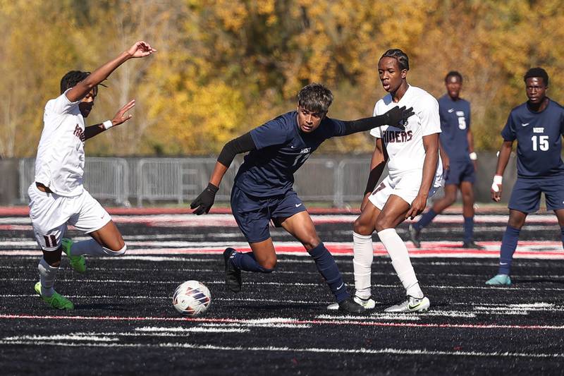 West Aurora’s Allen Ortiz works the ball against Bolingbrook in the Class 3A Bolingbrook Regional championship match on Saturday, Oct. 26, 2024 in Bolingbrook.