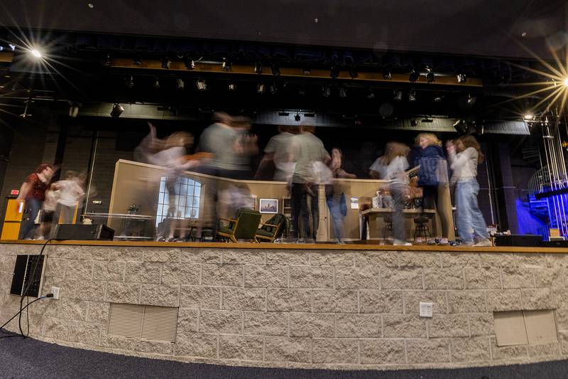 Sterling’s Drama and Group Interpretation team works feverishly to construct a set Wednesday, March 25, 2026, at Centennial Auditorium. In contest play competition, the team has 20 minutes total to set up and tear down the set.