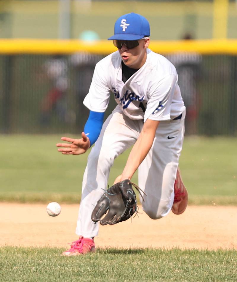 St. Francis' Zach Maduzia fields a grounder during their Class 3A regional semifinal game against Sycamore Thursday, June 1, 2023, at Kaneland High School in Maple Park.