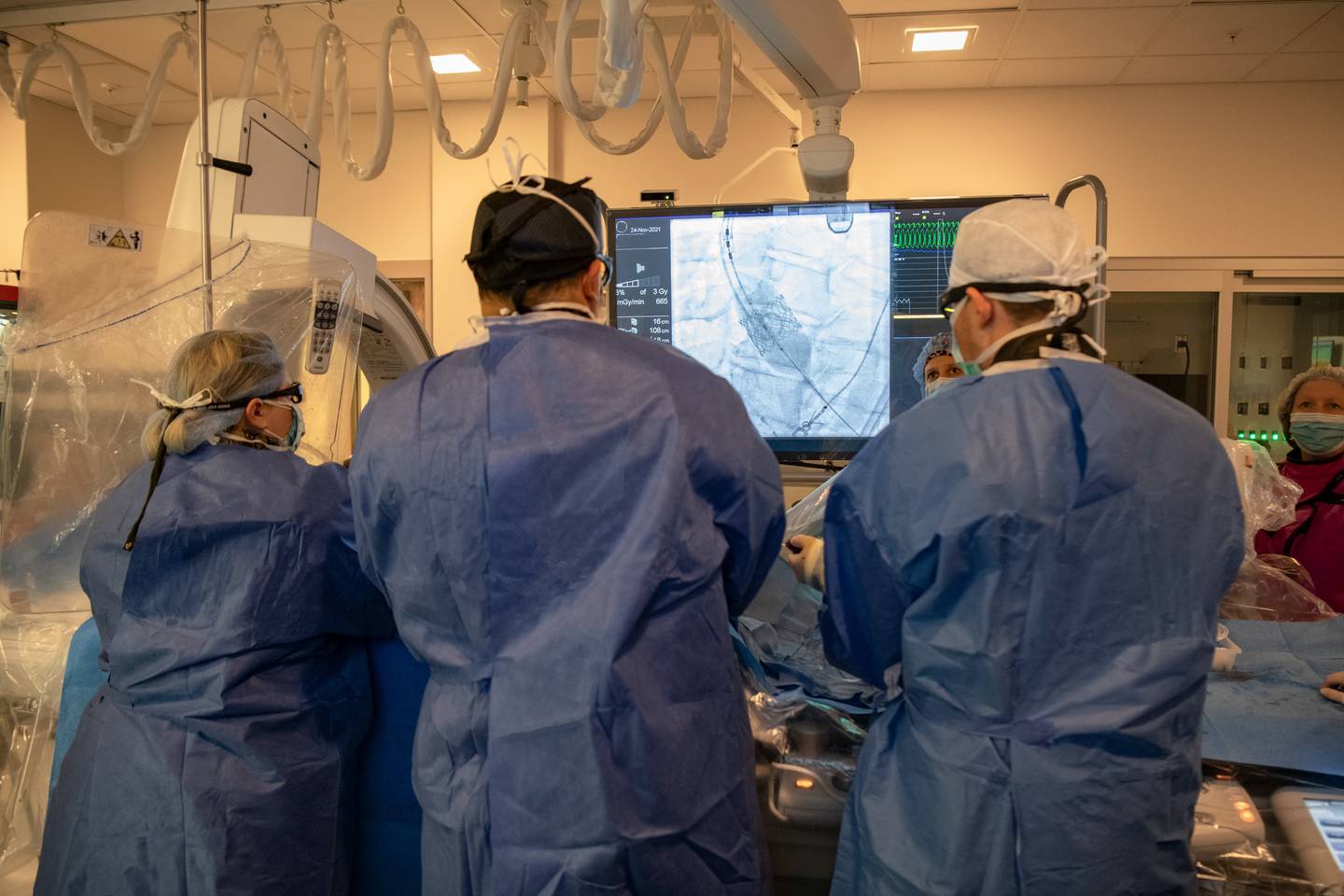 Medical staff at Northwestern McHenry Hospital perform the hospital's 100th Transcatheter Aortic Valve Replacement.