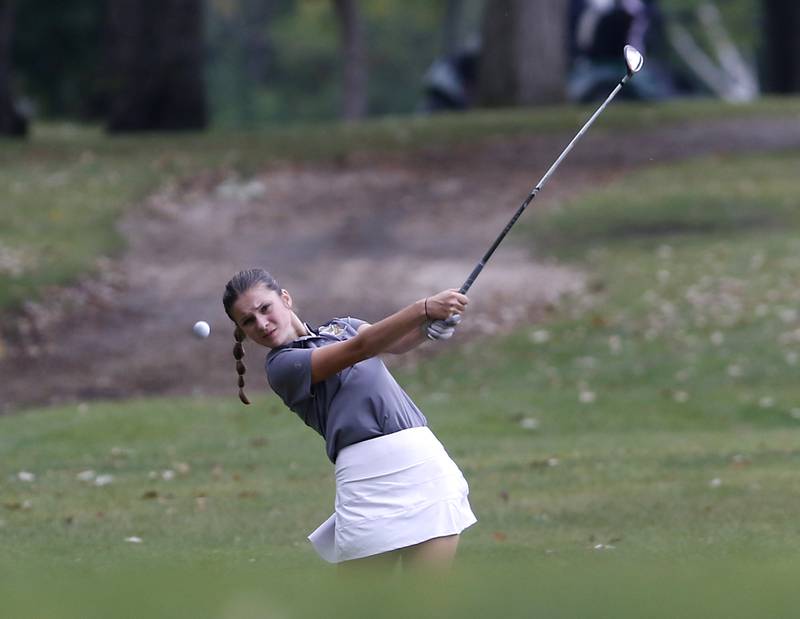 Jacobs’ Nicole Heims watches her fairway shot on the 18th hole during the Fox Valley Conference Girls Golf Tournament Wednesday, Sept. 20, 2023, at Crystal Woods Golf Club in Woodstock.