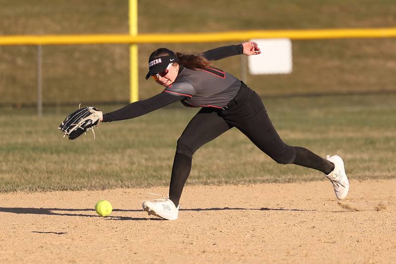 Bolingbrook’s Carly Schoop makes an attempt on the line drive against Plainfield Central on Wednesday, March 20, 2024.