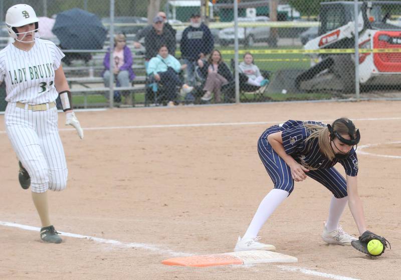 Marquette's Avery Durdan makes a catch at first base to force out St. Bede's Maddy Dalton on Thursday, April 18, 2024 in Ottawa.