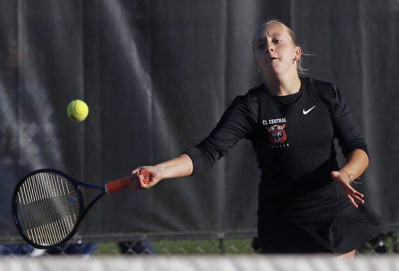 Crystal Lake Central’s Evie Johnson returns the ball Thursday, Oct. 23, 2025, during the first day of the IHSA State Girls Tennis Tournament at Schaumburg High School.