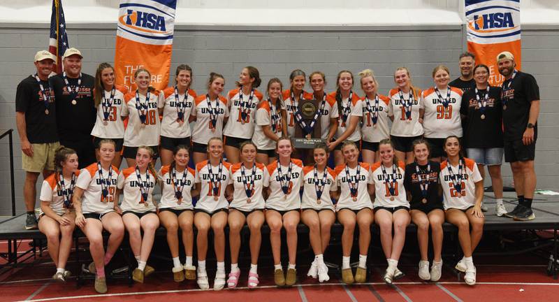 Crystal Lake Central Coop players pose with their fourth-place trophy after the third-place game of the girls lacrosse state finals at Hinsdale Central High School on Saturday, June 7, 2025.