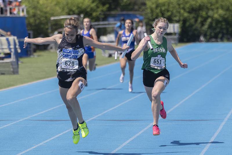 Seneca’s Isabelle O’Neal (right) comes up a bit short in the 4x200 against Rockford Christian’s Avery Demo Saturday, May 20, 2023 during the IHSA state track and field finals at Eastern Illinois University in Charleston.