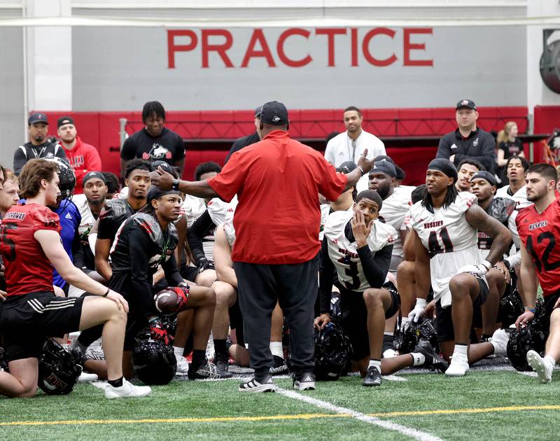 Northern Illinois football head coach Thomas Hammock talks to his team during the first spring football practice Thursday, March 27, 2025, in the Chessick Practice Center at NIU in DeKalb.