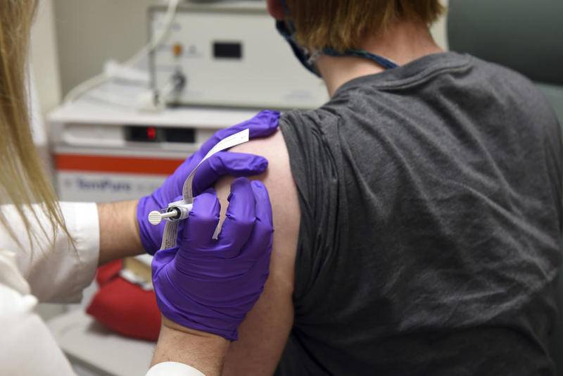 FILE - This May 4, 2020, file photo provided by the University of Maryland School of Medicine, shows the first patient enrolled in Pfizer's COVID-19 coronavirus vaccine clinical trial at the University of Maryland School of Medicine in Baltimore.  On Monday, Nov. 9, 2020, Pfizer said an early peek at its vaccine data suggests the shots may be 90% effective at preventing COVID-19. (Courtesy of University of Maryland School of Medicine via AP, File)