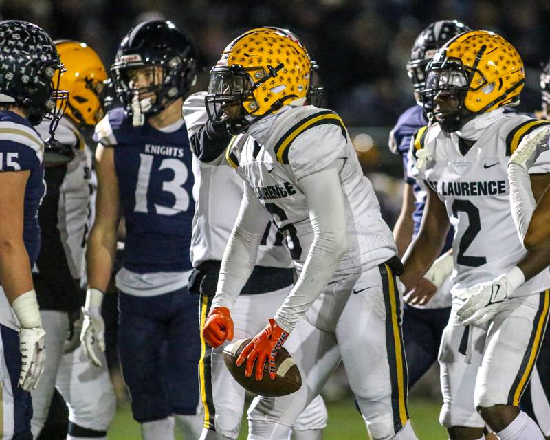 St Laurence's Aaron Ball (6) celebrates a touchdown during Class 4A third round playoff football game between St Laurence at IC Catholic Prep.  Nov 11, 2023.