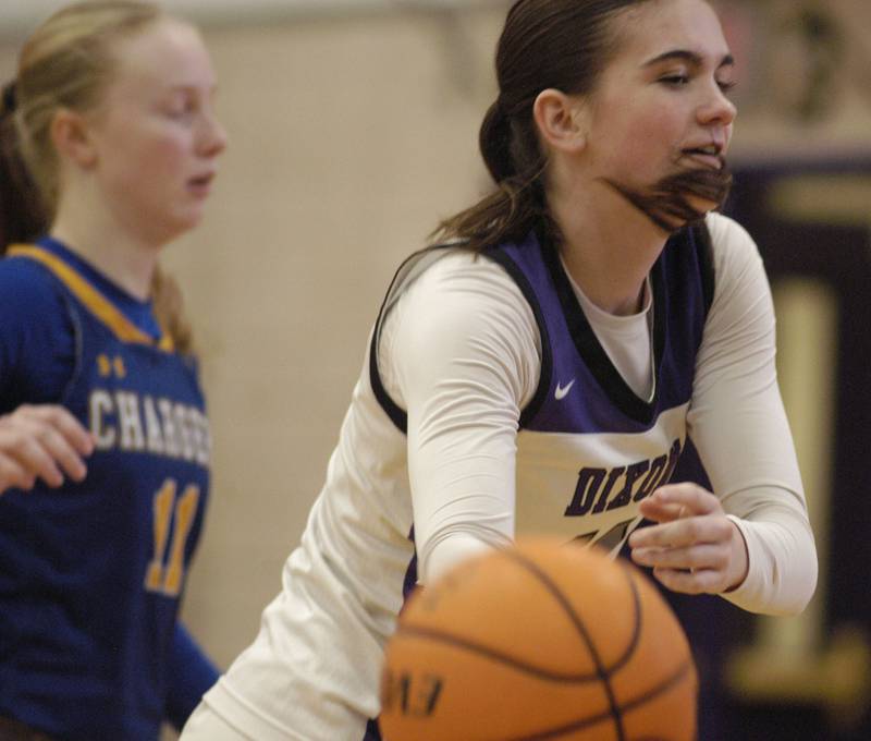 Dixon's Kiley Gaither tosses the ball to a teammate. The Dixon Duchesses played  the Aurora Central Catholic Chargers in the Dixon Holiday Tournament at Dixon High School on Friday, December 26th, 2025