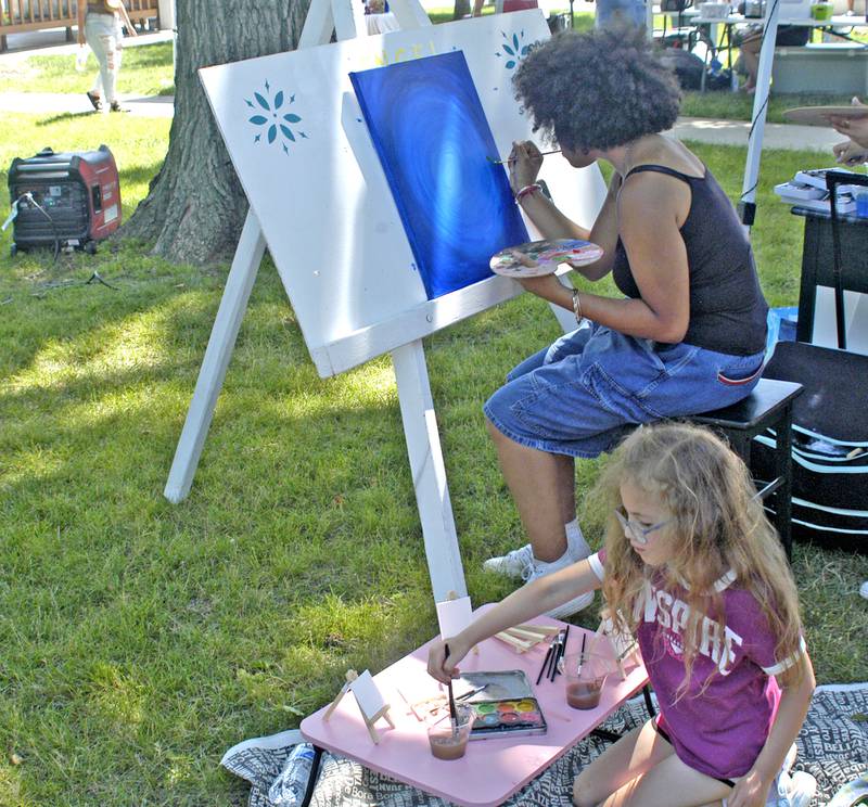 Relbya Gallindo and Najeyah Wallace paint in the park at the event. The Sauk Valley Diversity Alliance hosted a Juneteenth Celebration Event on Saturday, June 21st, 2025 at the Grandon Civic Center in Sterling.