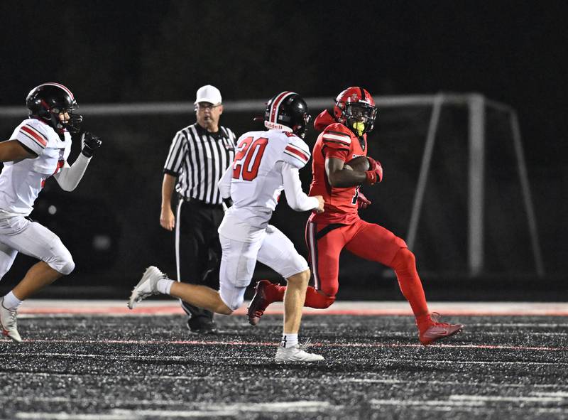 Bolingbrook's Kyan Berry Johnson tries to elude a defender during a non-conference game against Lincoln-Way Central on Friday, Sep. 29, 2023, at Bolingbrook. (Dean Reid for Shaw Local News Network)
