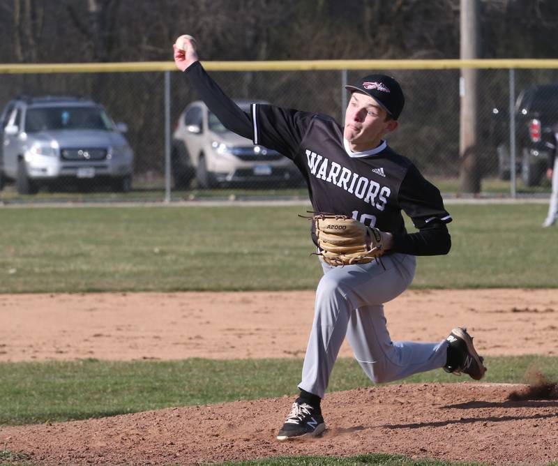 Woodland/Flanagan-Cornell's Tucker Hill lets go of a pitch to Marquette on Wednesday, March 27, 2024 at Masinelli Field in Ottawa.