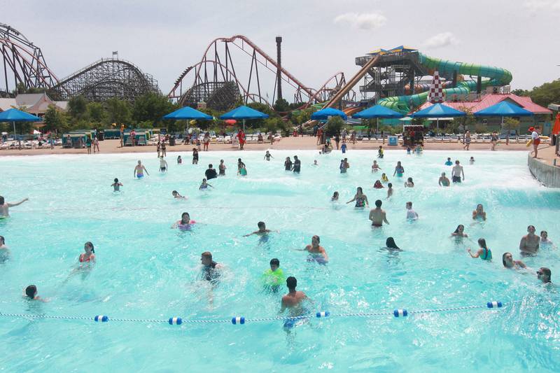 Guests enjoy the Hurricane Bay wave pool in July 2021 at Six Flags Great America in Gurnee.