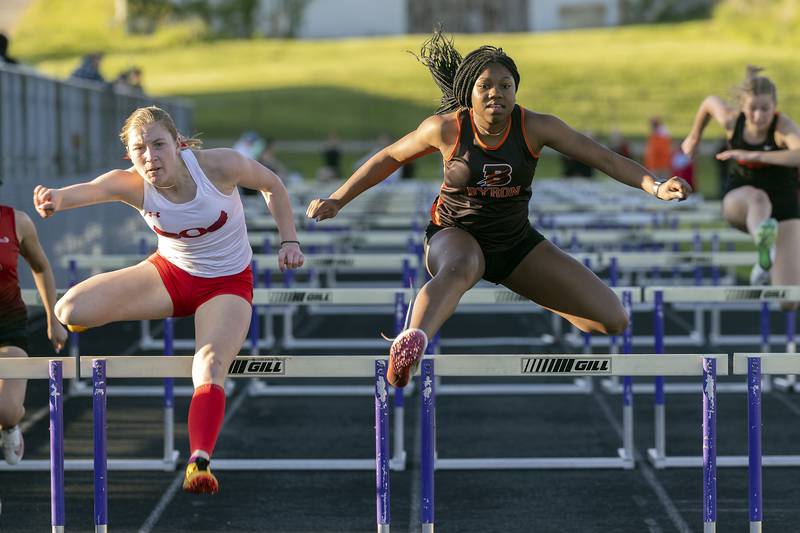 Oregon’s Jillian Hammer (left) just edges Byron’s Malia Morton Thursday, May 8, 2025, during the girls Big Northern Conference track meet.