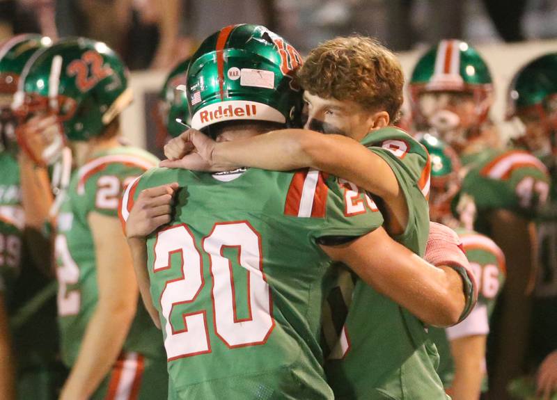 L-P's Greyson Ernat hugs teammate Grifin May after loosing to Kaneland on Friday, Oct. 17, 2025 at Howard Fellows Stadium.