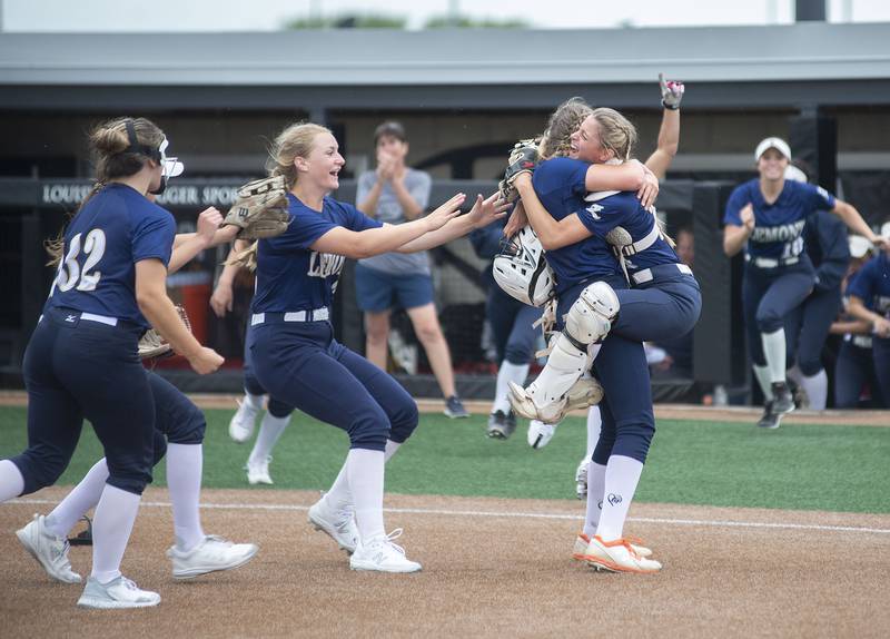 Lemont players celebrate after defeating Antioch 3-1 Friday, June 10, 2022 in the class 3A IHSA state softball semifinal game.
