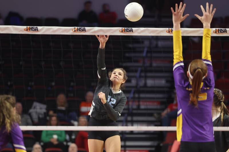 Joliet Catholic’s Ellie Blotnik hits a shot against Taylorville in the Class 3A 3rd place match on Saturday in Normal.