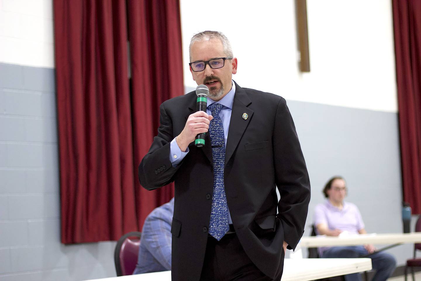 Will County Undersheriff Dan Jungles speaking to the audience on Wednesday, Jan. 28, 2025 at the community center at St. John's United Church of Christ in Mokena.