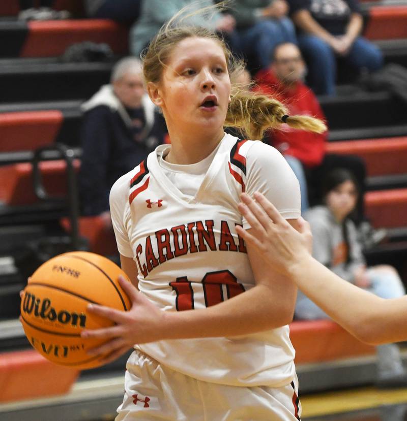 Forreston's Eva Hundertmark (10) looks to pass during a Saturday, Jan. 3, 2026 game with Oregon at Forreston High School.