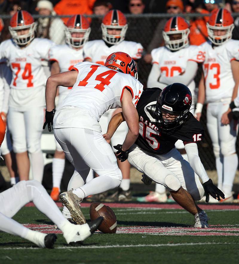 Glenbard East's Dylan Novak (15) tries to get in position to grab a loose ball during the IHSA Class 7A quarterfinals Saturday November 11, 2023 in Lombard.