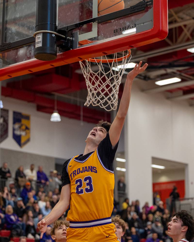 Dane Doyle (23) of Mendota lays ball up during the championship game of the Colmone Classic on Saturday, December 20, 2025 at Hall High School in Spring Valley.