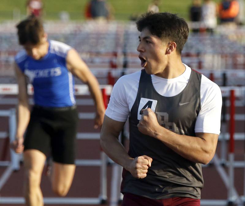 Prairie Ridge's Alexander Trejo celebrates winning the 110 meter high hurdles during the Fox Valley Conference  Boys Track and Field Meet on Thursday, May 14, 2026, at Huntley High School.