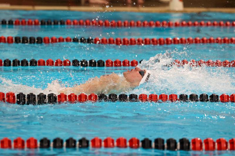 Bradley-Bourbonnais' Eli Swafford leads the 100-yard backstroke race during the All-City meet on Tuesday, Jan. 6, 2026. Swafford would take first with a time of 55.96 seconds, setting a new school record in the event.