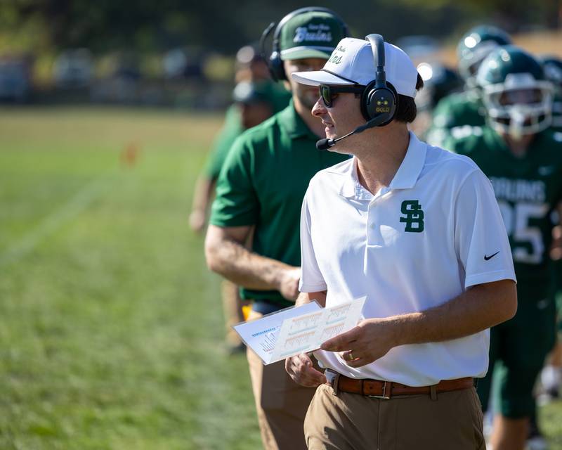 St. Bede Head Coach, Jack Brady walks on sideline on Saturday, Oct. 4, 2025 at Captain Thomas J. Heitmann field in Peru.