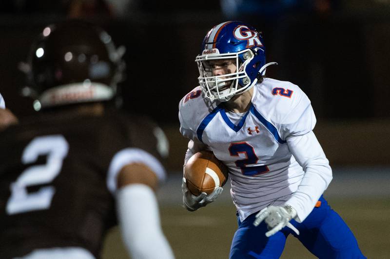 Genoa-Kingston's Brody Engel runs the ball during their IHSA Class Class 4A football playoff quarterfinal game at Joliet Memorial Stadium on Saturday,Nov. 13, 2021.