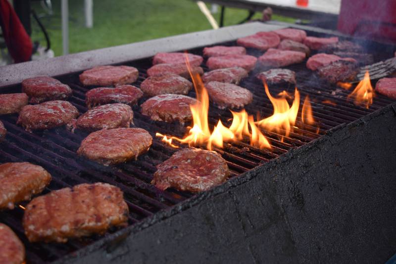 Free hamburgers are grilled for Burger Bash, an annual Purdue Ag Week tradition.