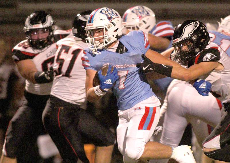 Marian Central’s Eddie Kowalczyk runs the ball in varsity football against Aurora Christian at George Harding Field on the campus of Marian Central High School in Woodstock on Friday, Oct. 11, 2024.